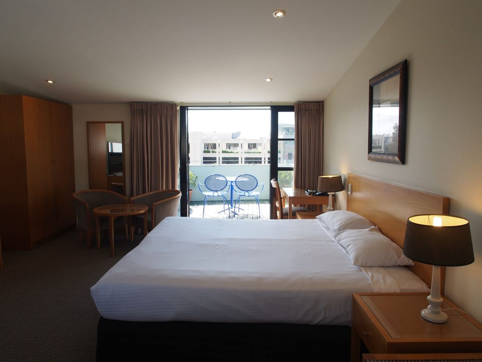 Executive Room with Balcony | Individually furnished, desk, iron/ironing board, free WiFi