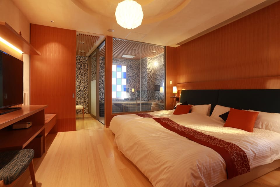 Suite [Ao], Non Smoking | Premium bedding, down comforters, in-room safe, iron/ironing board