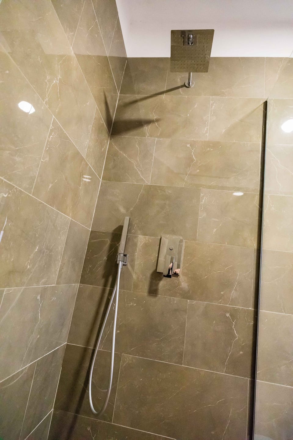 Separate tub and shower, hair dryer, bidet, towels