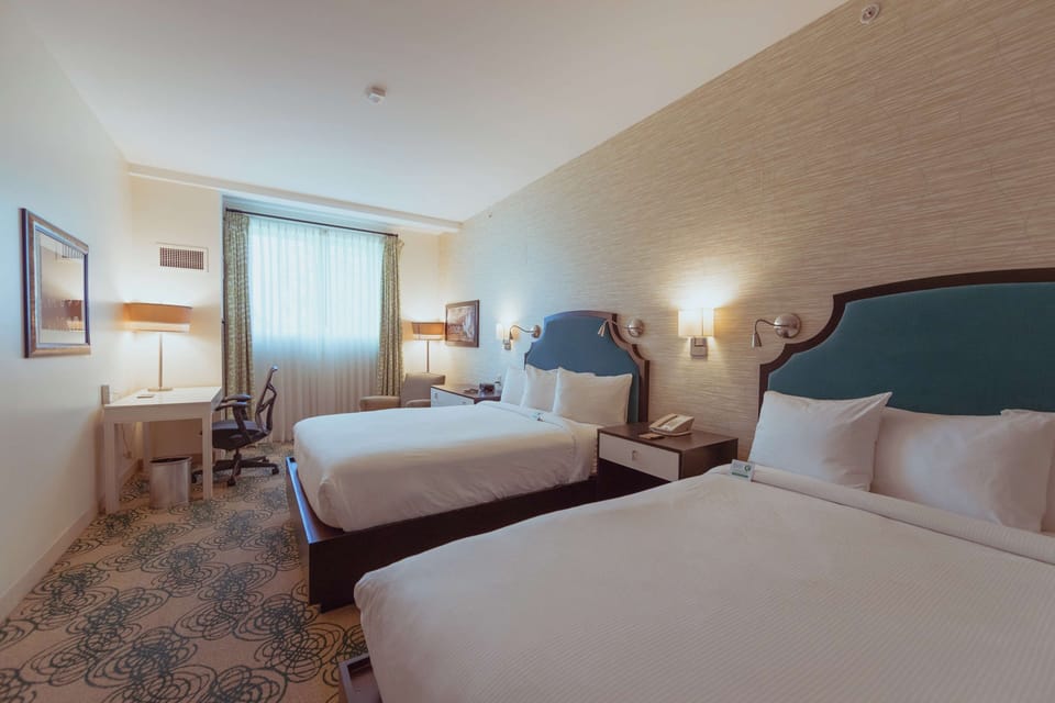 Room, 2 Queen Beds, Non Smoking | Premium bedding, in-room safe, individually decorated