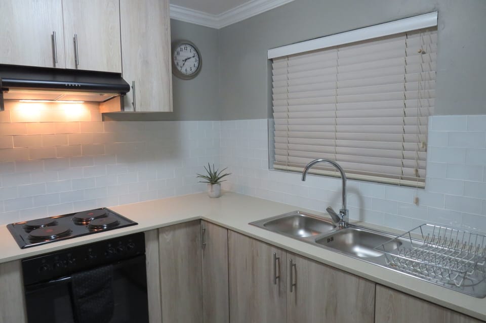 Executive Suite, 1 King Bed, Non Smoking, Garden View (Self-Catering) | Private kitchen | Fridge, electric kettle, freezer
