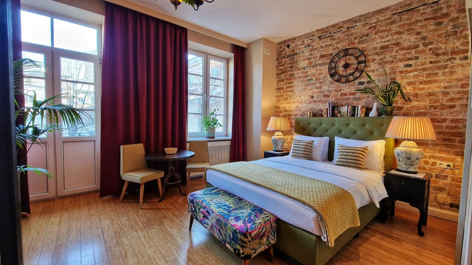 Deluxe Room, Balcony | In-room safe, individually decorated, individually furnished