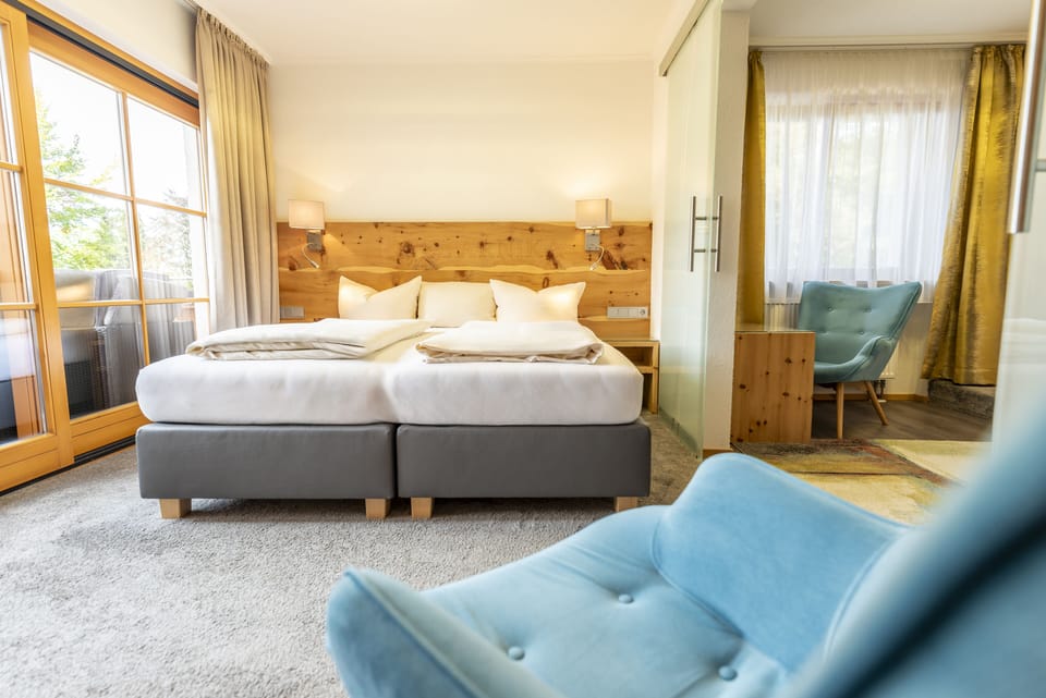 Superior Suite, 1 Bedroom, Balcony | Down comforters, in-room safe, individually decorated