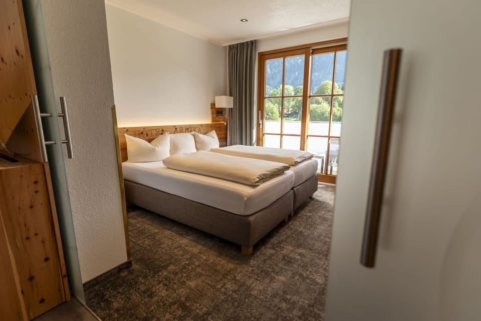 Superior Suite, 1 Bedroom, Balcony | Down comforters, in-room safe, individually decorated