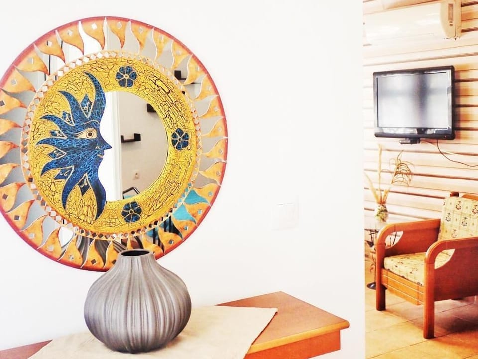 Milto's Apartment | Living area | TV