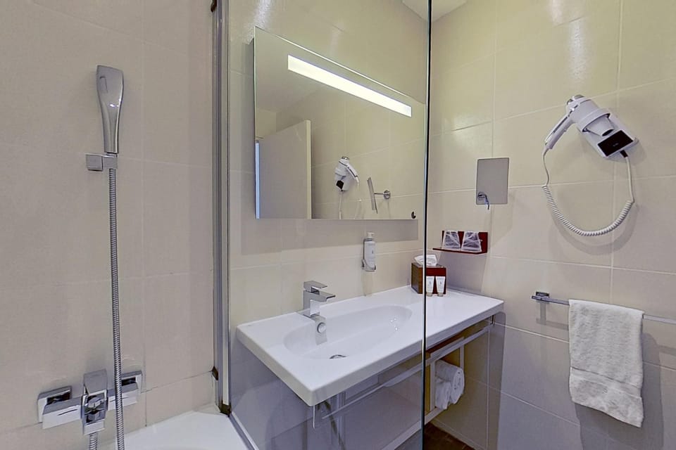 Free toiletries, hair dryer, bathrobes, slippers