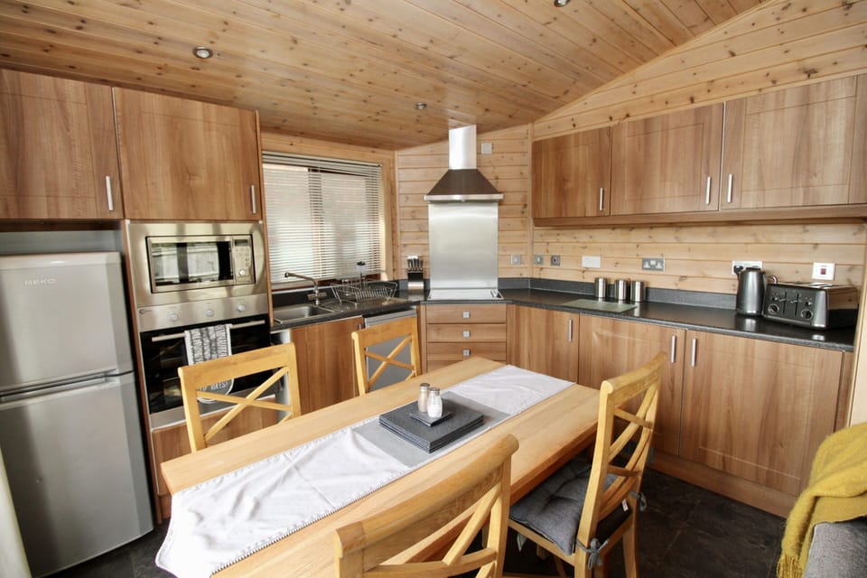 Standard Apartment, Private Bathroom (self-contained log cabin) | Private kitchen | Highchair