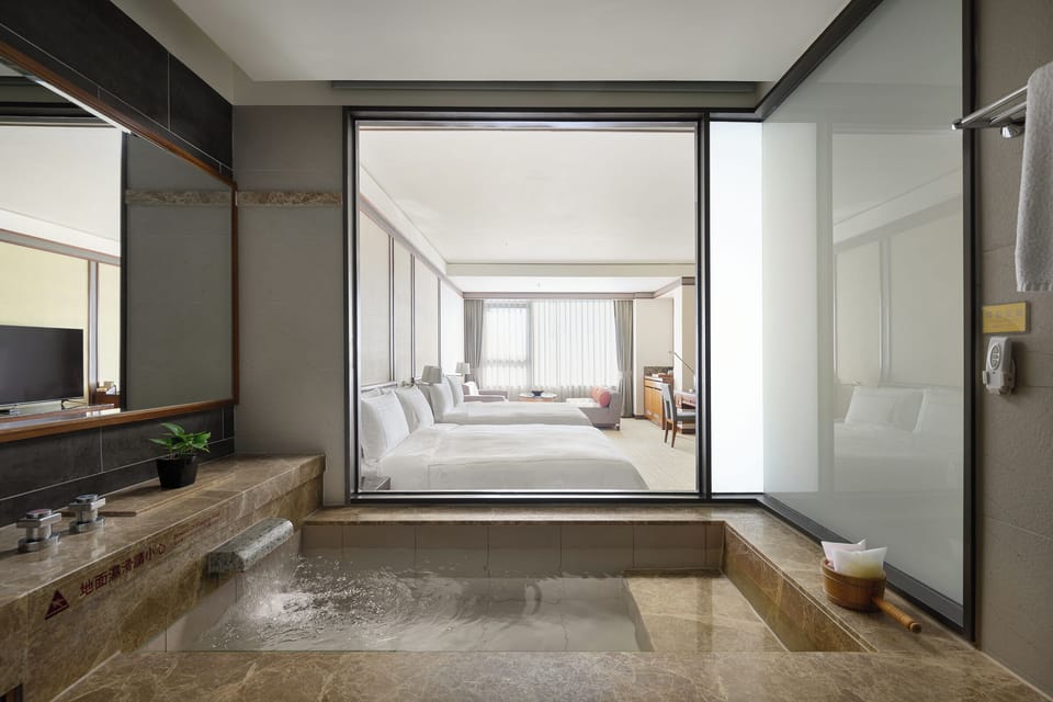 Deluxe Family Room | Bathroom | Separate tub and shower, spring water tub, rainfall showerhead