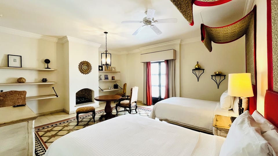 Suite, 2 Double Beds | In-room safe, blackout drapes, iron/ironing board, free WiFi