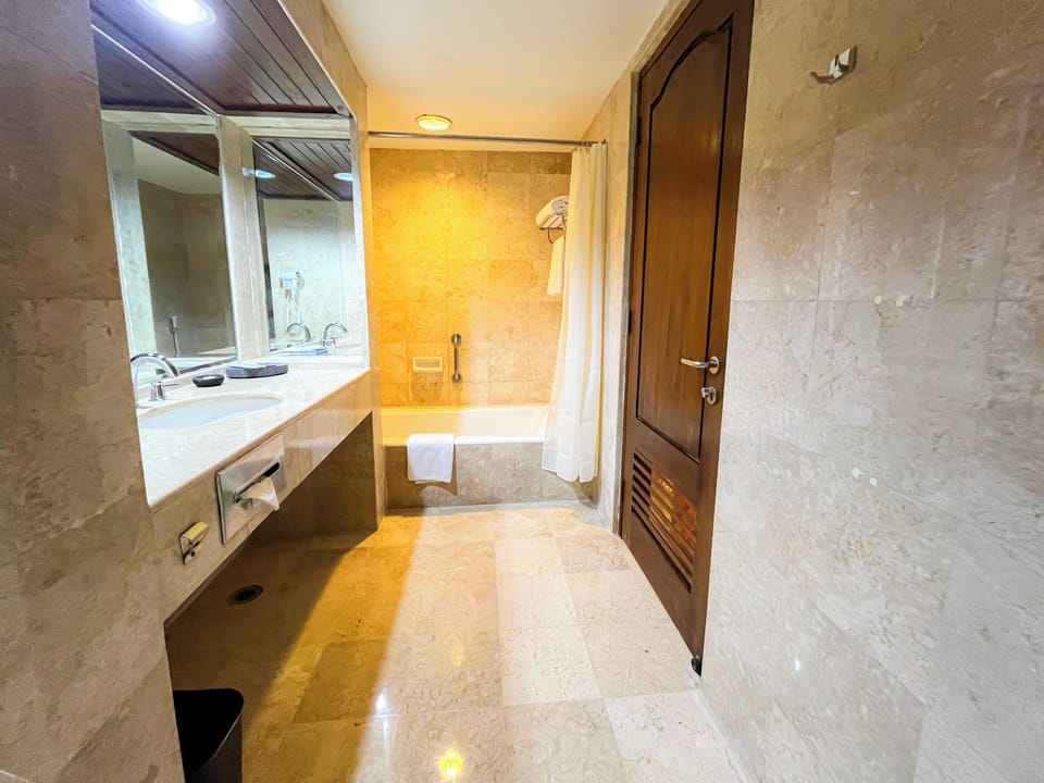 Shower, free toiletries, hair dryer, slippers