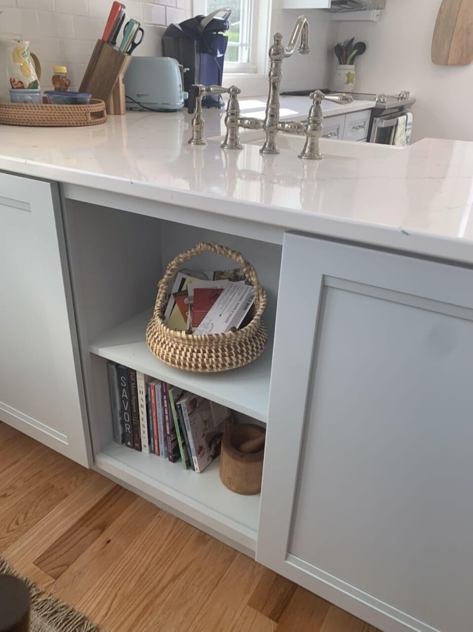 Storage cabinets on dining side