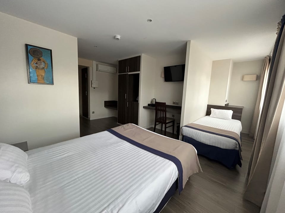 Triple Room | Desk, free WiFi, bed sheets, wheelchair access