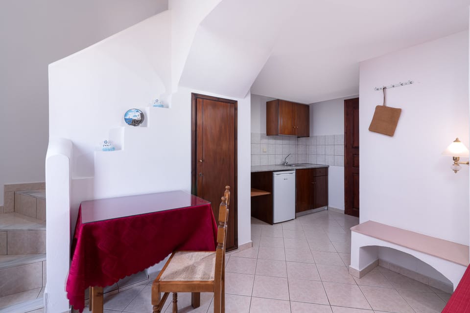 Duplex, Partial Sea View | Private kitchenette | Fridge, electric kettle, cookware/dishes/utensils