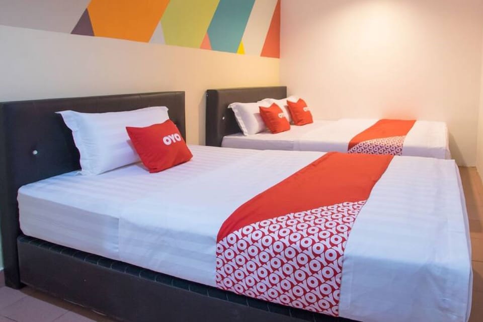 Standard Triple Room | Desk, laptop workspace, WiFi (free), bed sheets
