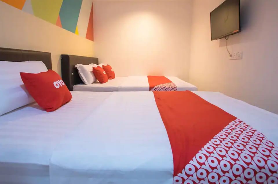 Standard Triple Room | Desk, laptop workspace, WiFi (free), bed sheets