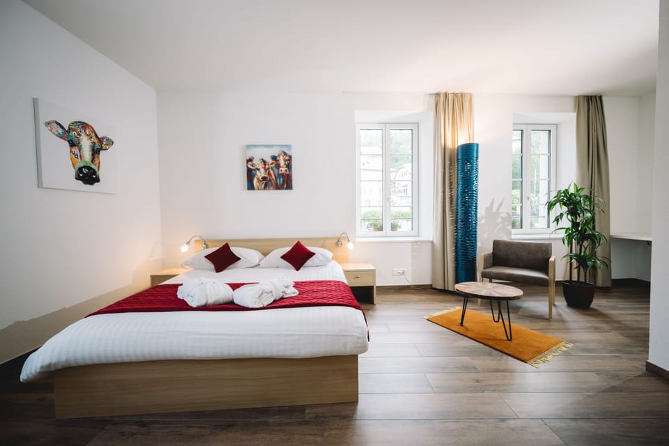 Superior Room | Minibar, in-room safe, desk, laptop workspace