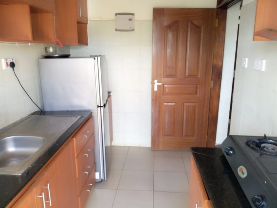 Apartment | Private kitchen | Fridge, stovetop, electric kettle, cookware/dishes/utensils