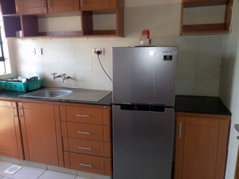 Apartment | Private kitchen | Fridge, stovetop, electric kettle, cookware/dishes/utensils