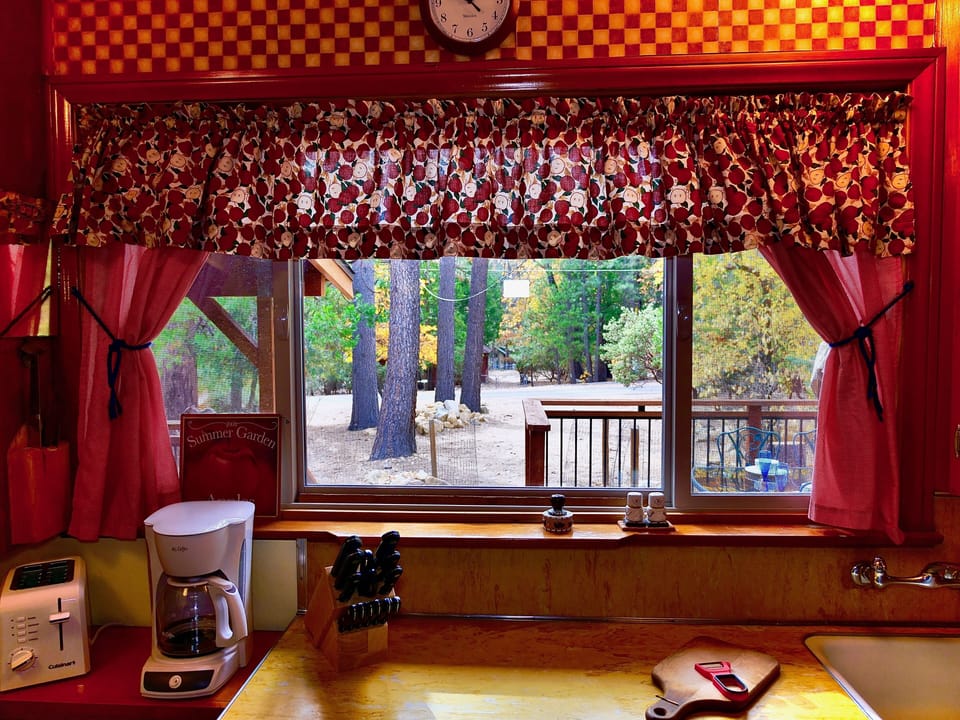 Home is nestled in the pines with tall pines surrounding. - Home is nestled in the pines with tall pines surrounding.