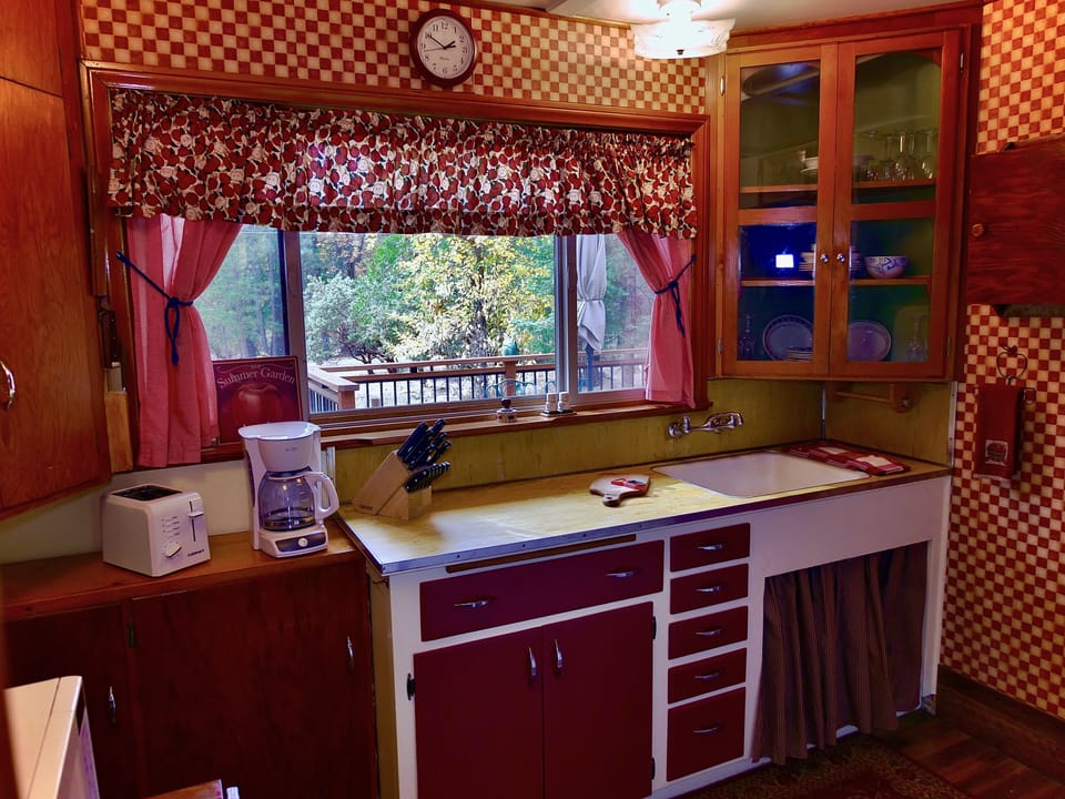 Full sized kitchen in this cozy cabin. - Full sized kitchen in this cozy cabin.
