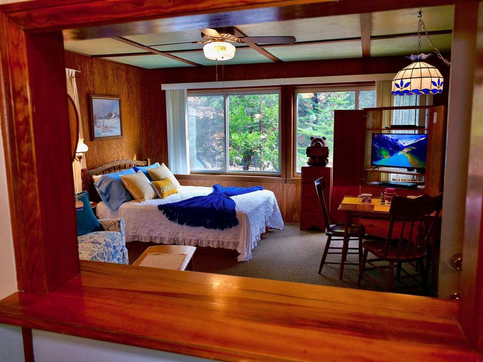 Window from kitchen allows you to look into bedroom area. - Window from kitchen allows you to look into bedroom area.