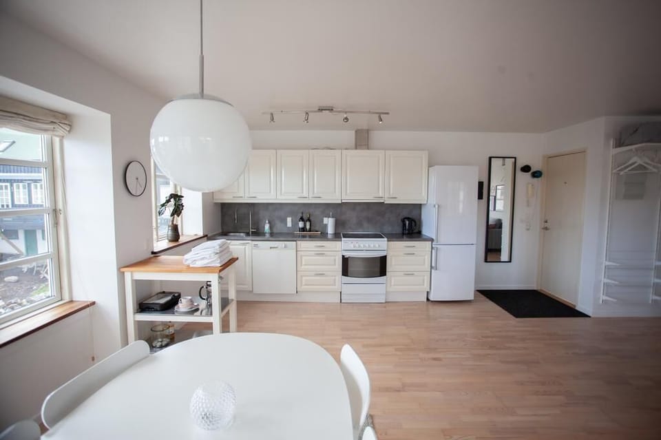 Apartment, 1 Bedroom | Private kitchen | Coffee/tea maker, full-size fridge, oven, stovetop