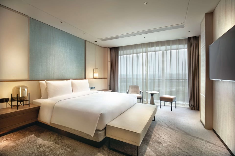 Premium bedding, down comforters, Select Comfort beds, minibar