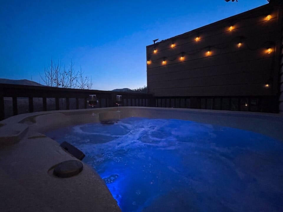 Dusk in the hot tub. Bring the wine.