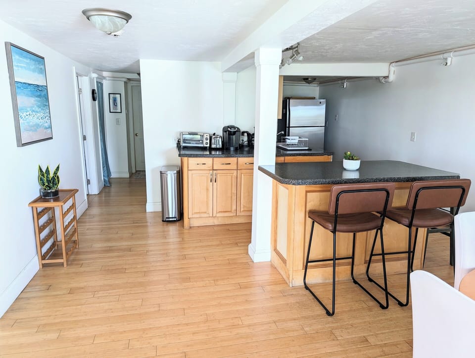 The kitchen has a keurig (with k-cups), electric kettle, pots, pans, etc.