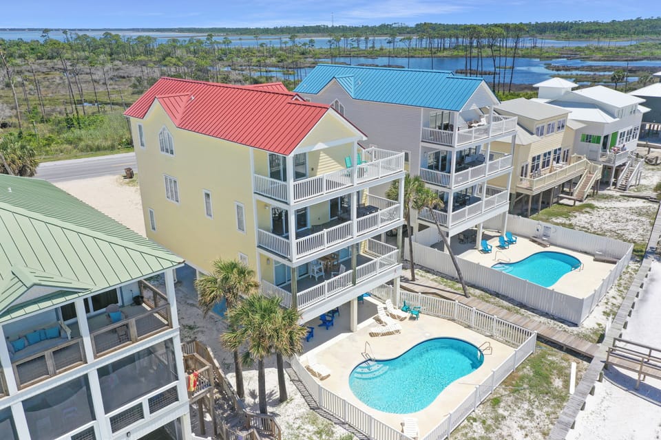 Beachfront Home with Pool and Bay in Background