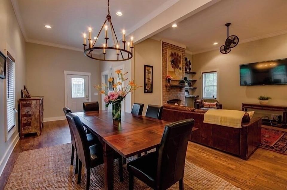 And the dining and living areas again with a view of the front door.