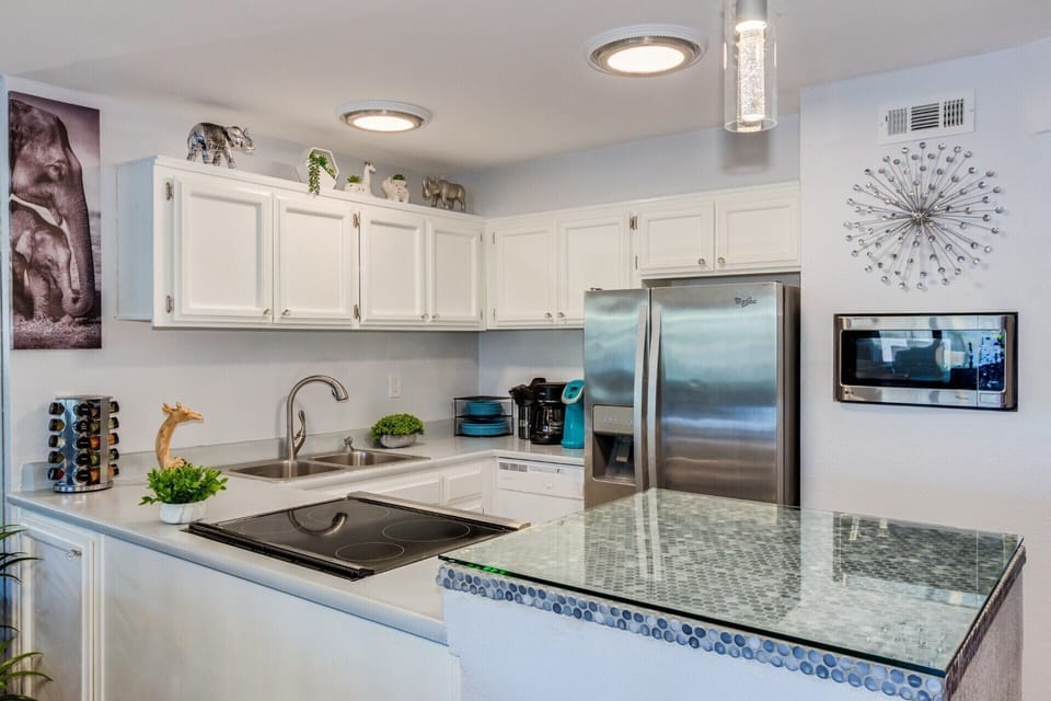 built-in microwave, brand new cooktop, new sink, stainless refrigerator