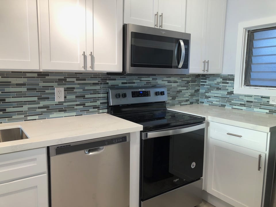 New kitchen tiled with all the colors of the sea