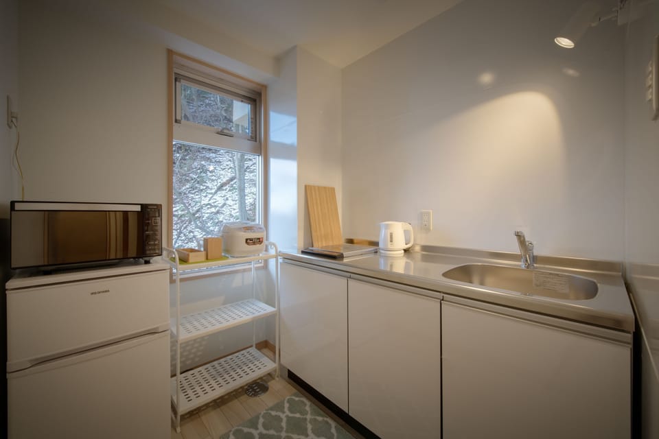 Family Room | Private kitchenette | Shared fridge, microwave