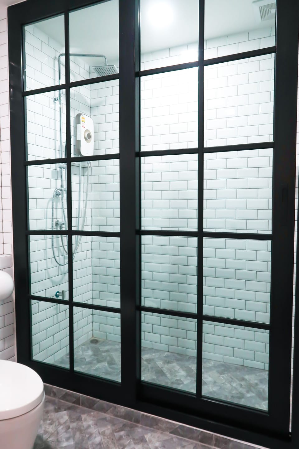 Family Room Type A | Bathroom | Shower, towels, soap