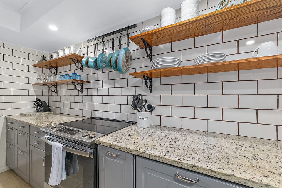 Spacious kitchen that is fully equipped and stocked with cooking essentials