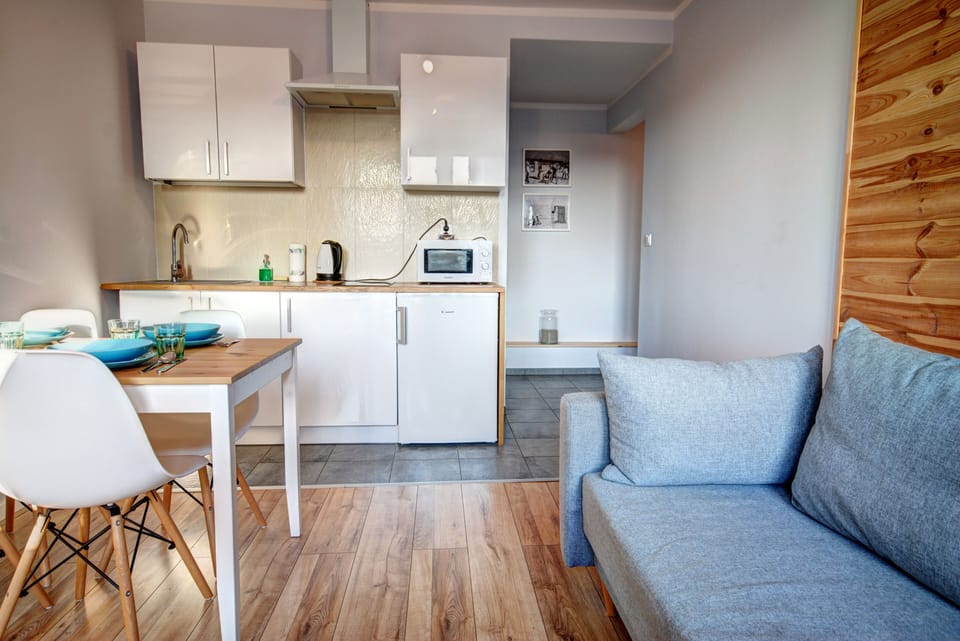 Apartment, 1 Bedroom | Living area | Flat-screen TV