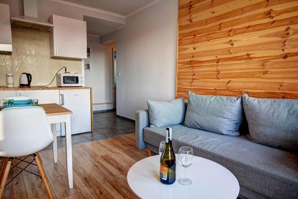 Apartment, 1 Bedroom | Living area | Flat-screen TV