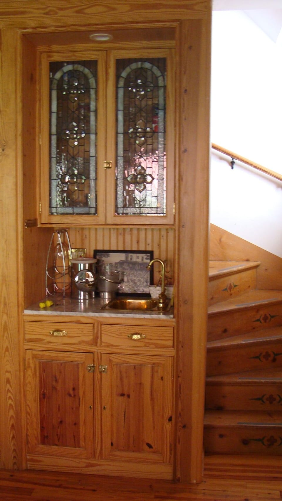 Wet bar adjacent to stairs to 2nd floor