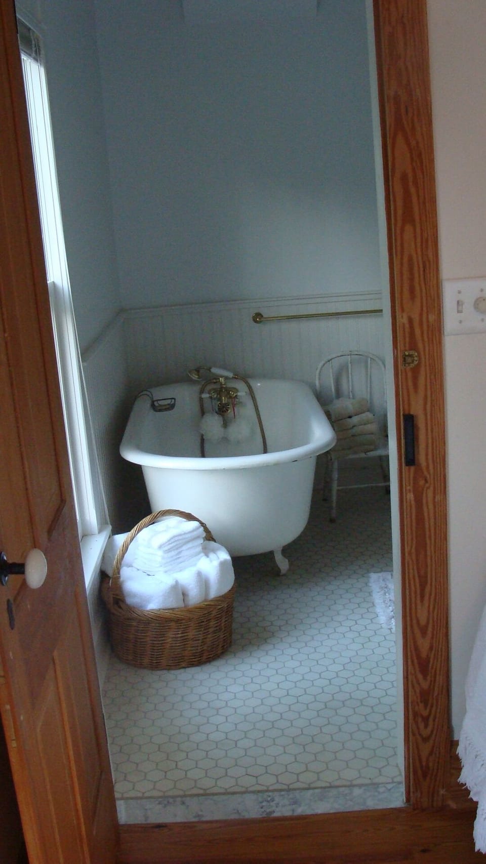 Guest bathroom with tub.  Separate stall shower is to the right