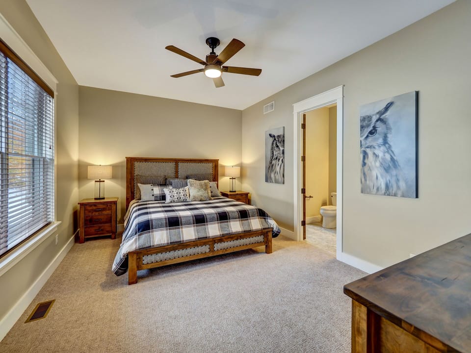 Main Floor Bedroom with private bathroom and closet