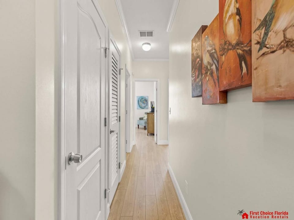 Bright, airy hallway leading to your cozy retreat