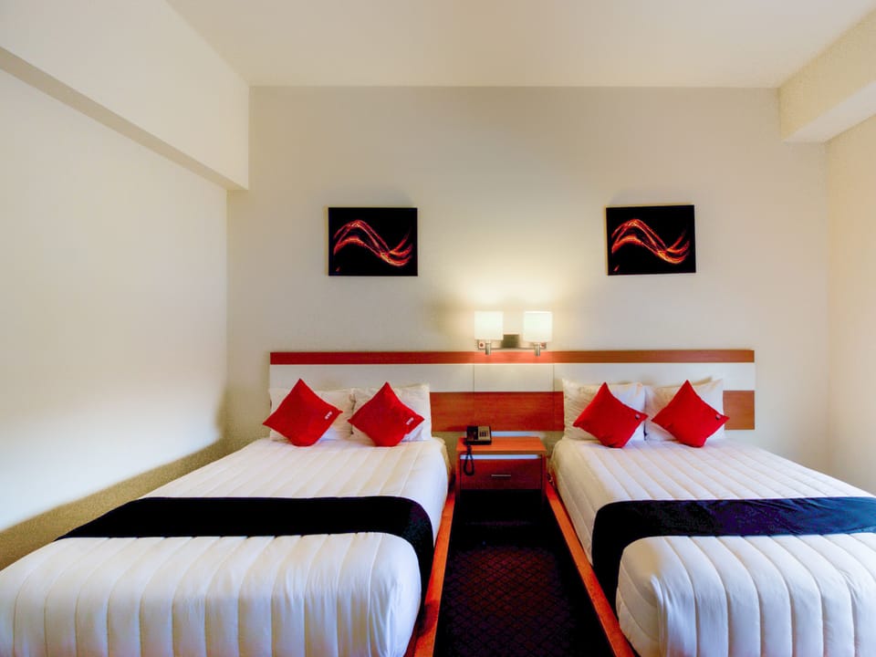 Premium bedding, down comforters, in-room safe, desk