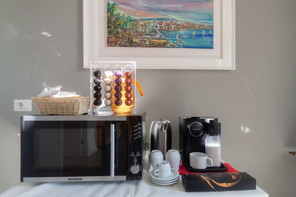 Double Room, Balcony | Coffee and/or coffee maker