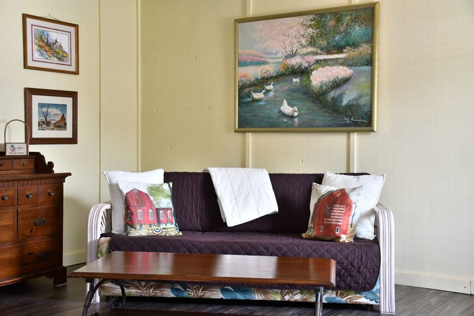 Pull out sleeper sofa with a queen size memory foam mattress.