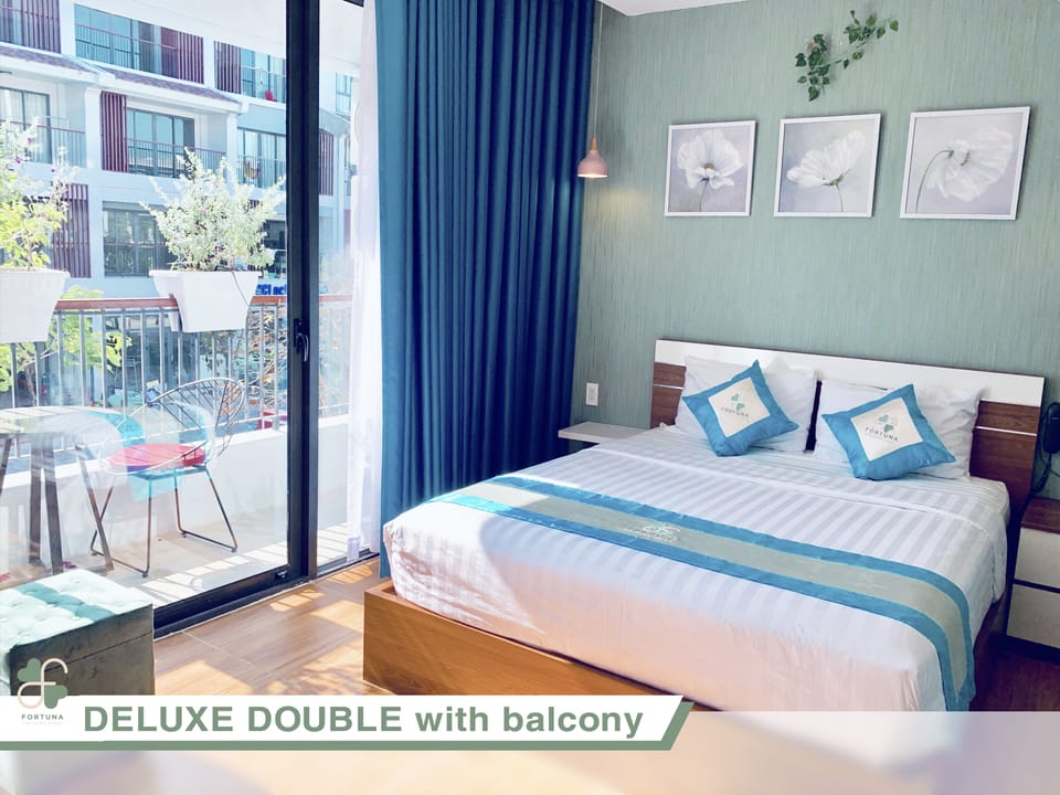 Deluxe Double Room, Balcony, Resort View | Hypo-allergenic bedding, minibar, in-room safe, blackout drapes