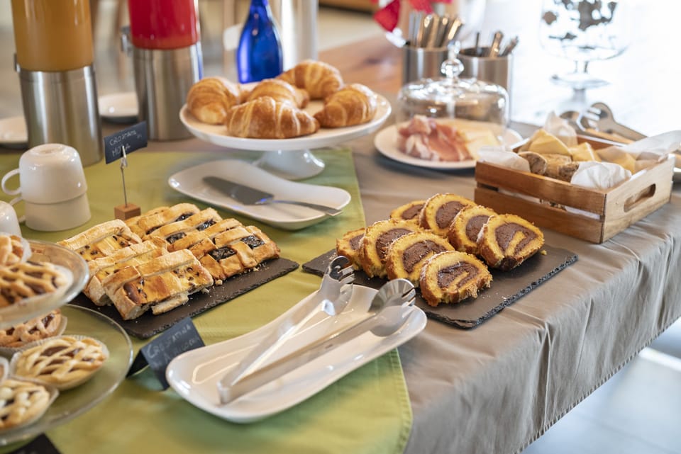 Daily buffet breakfast (EUR 15 per person)