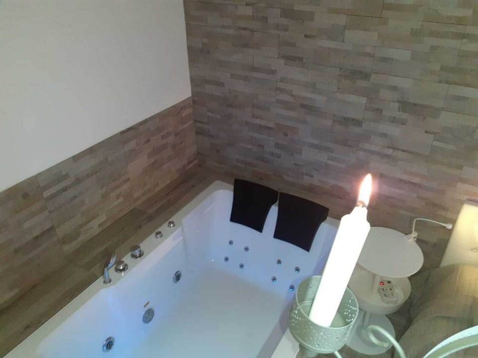 Romantic Studio Suite, Jetted Tub | Private spa tub