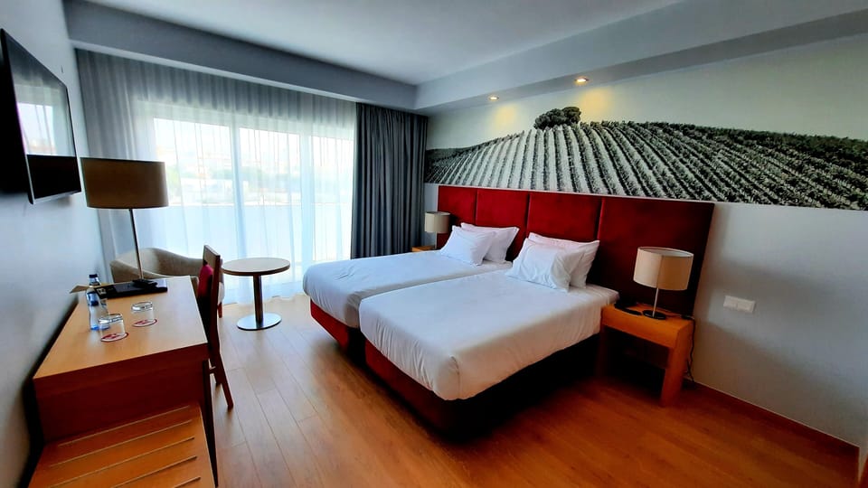 Superior Twin Room | Minibar, in-room safe, desk, soundproofing