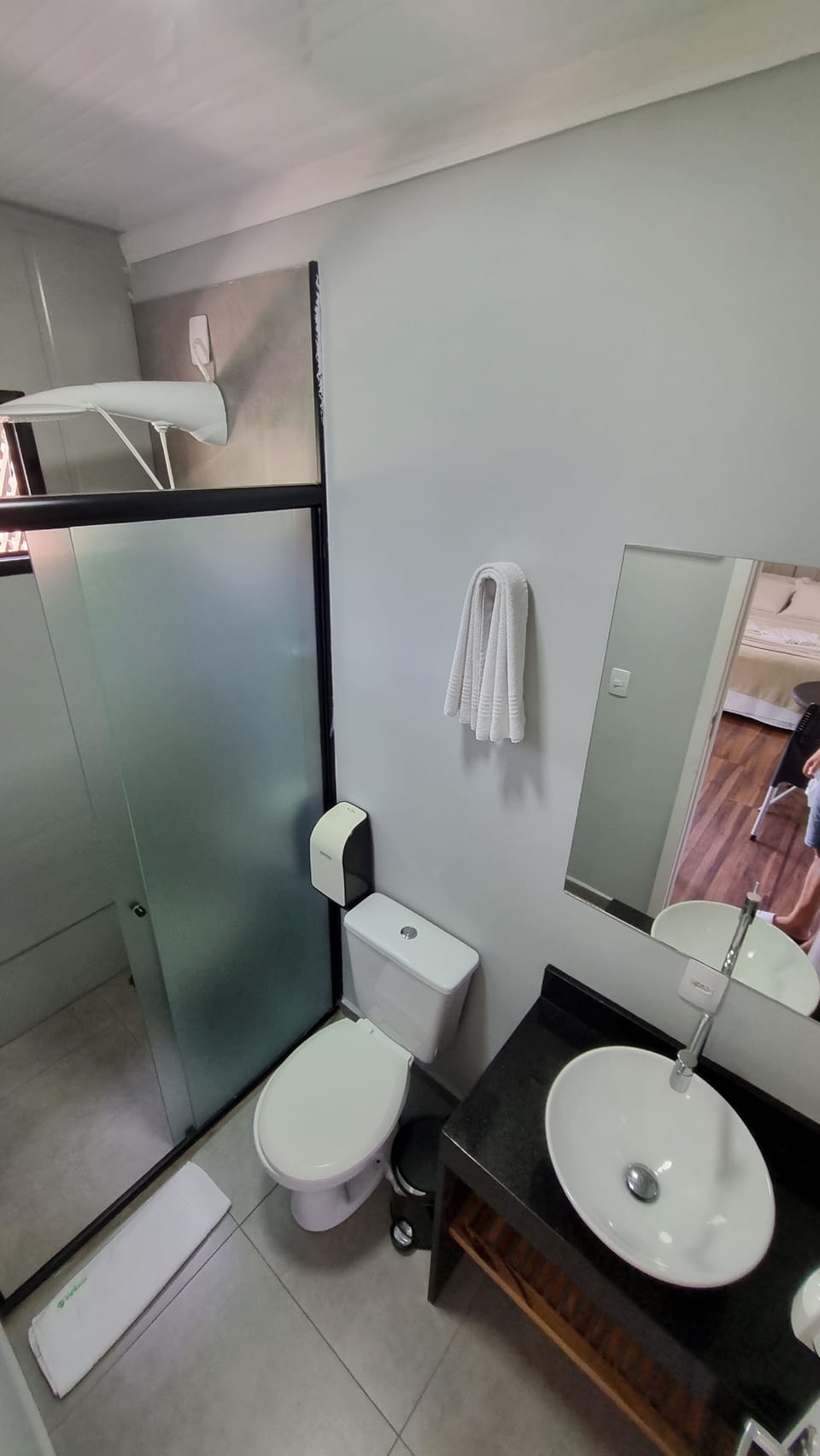 Shower, towels, soap, toilet paper